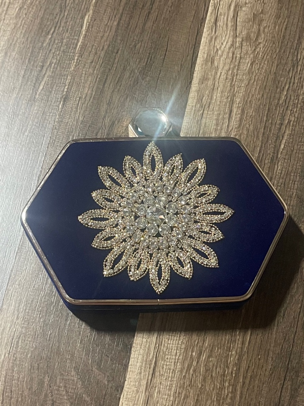 Shimmery Co. hexagonal Blue velvet clutch with Sunflower rhinestone brooch